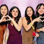 Girls posing the photo booth