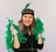 Lady dressed up with Gatsby props