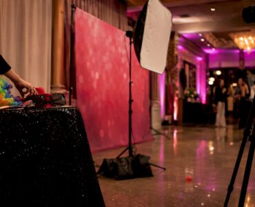 1786098092834_Photo-booth-with-props-and-lighting-at-prom Photo booth with props and lighting at prom