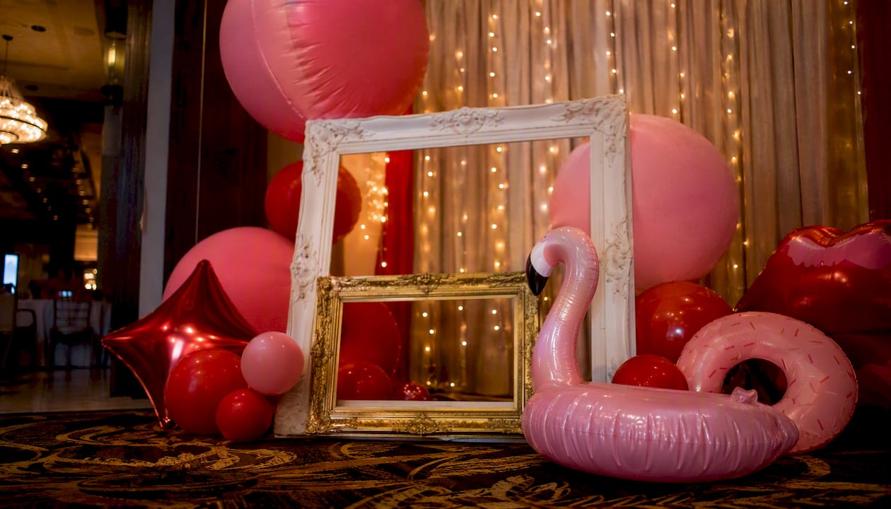Large oversized photo booth props at event venue